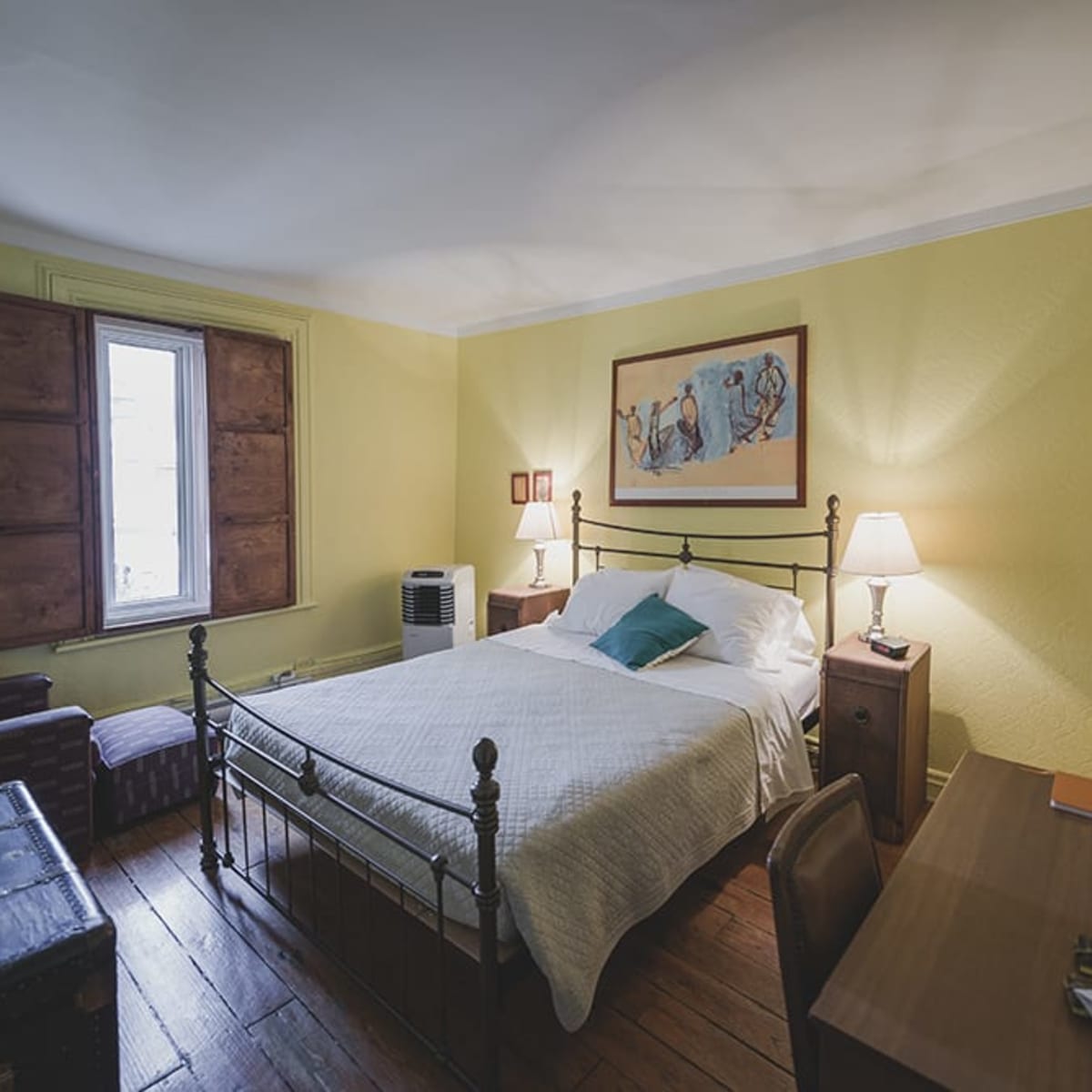 The Auguste room: double bed, shared bathroom
