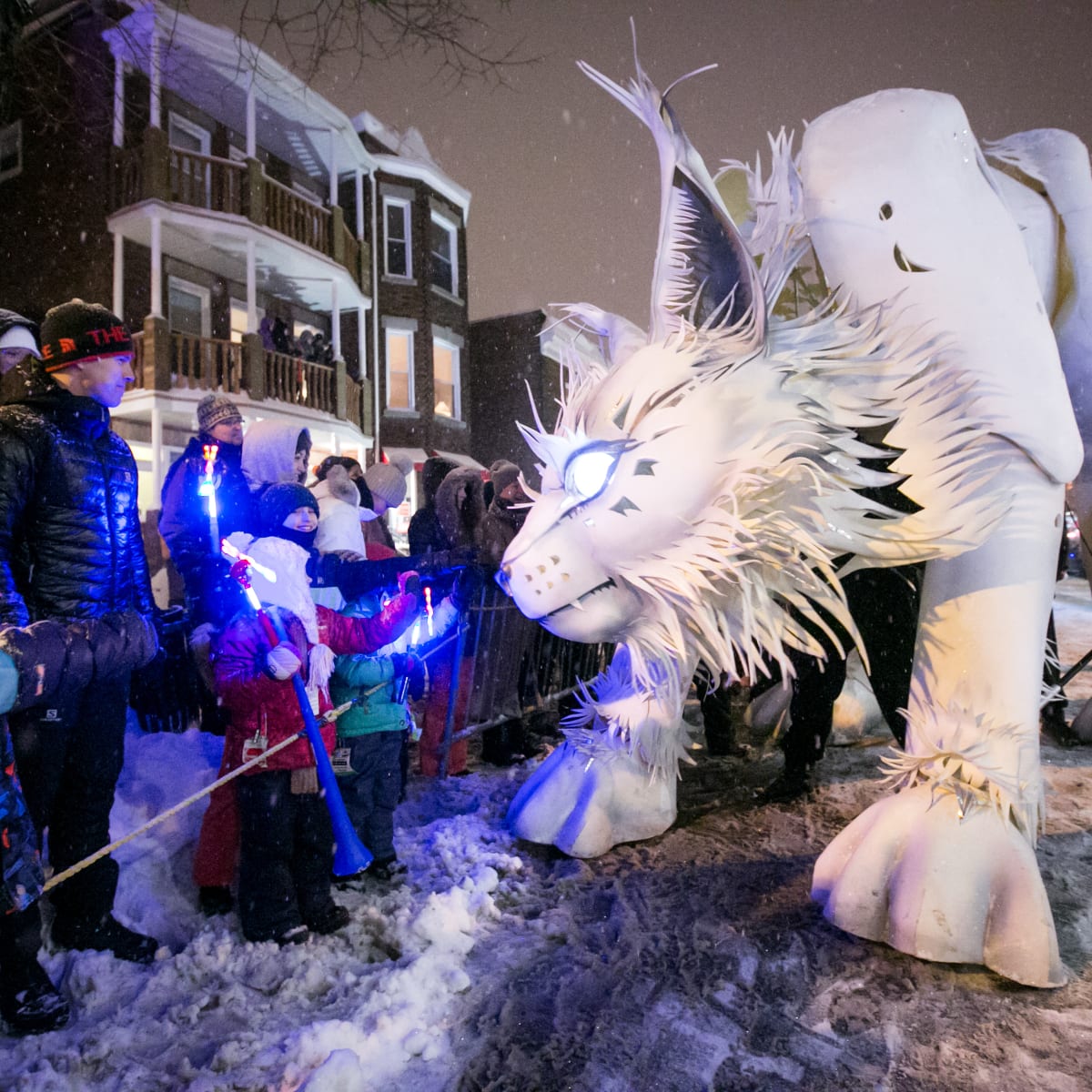Québec Winter Carnival - A large white creature at a winter parade