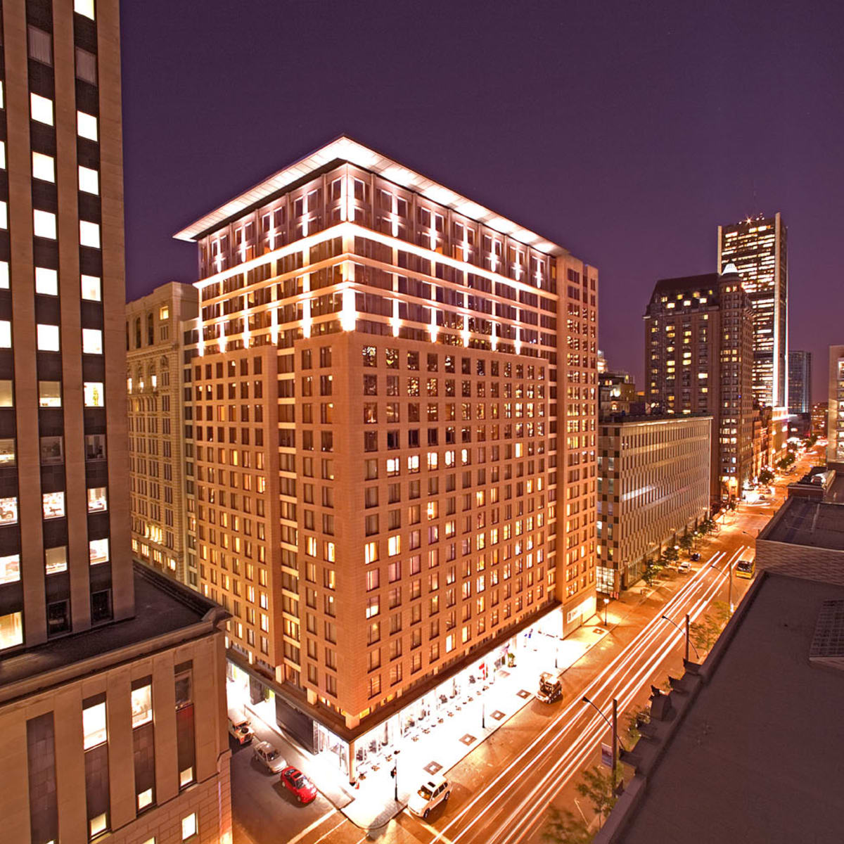 Embassy Suites by Hilton Montreal - Illuminated exterior of the hotel at night