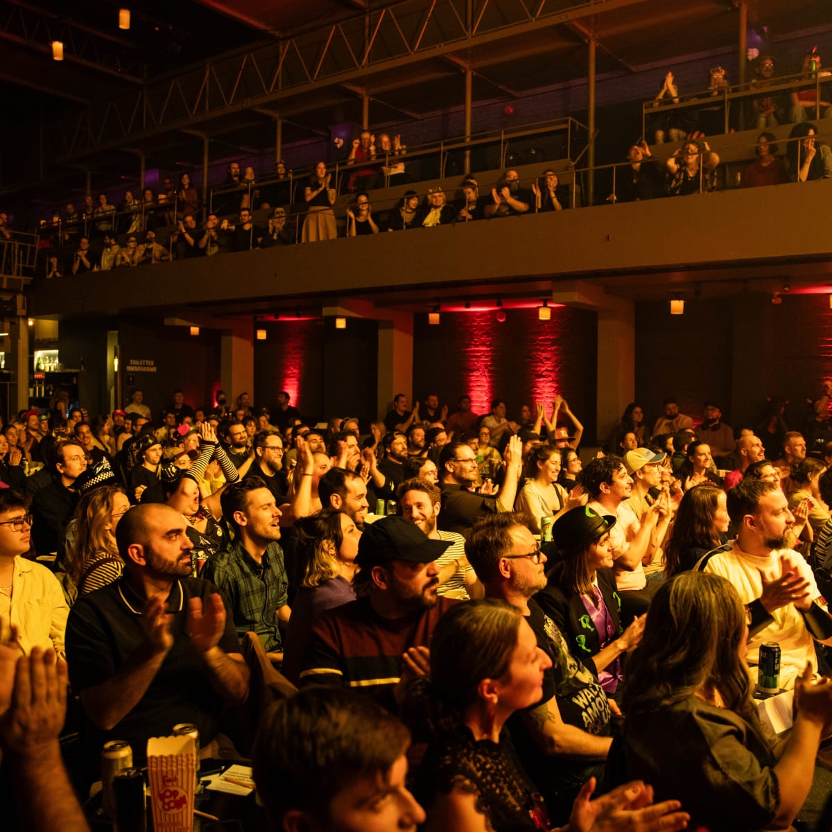 SPASM Festival - A venue is filled with spectators.
