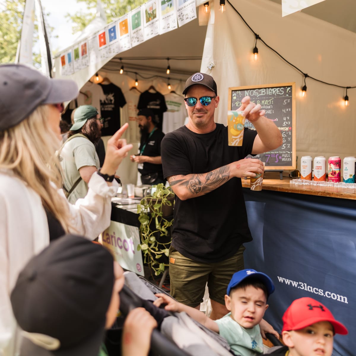 Family at a festival booth.