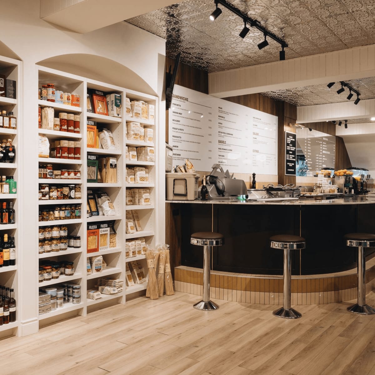 Display of local products and counter at Albert Café.