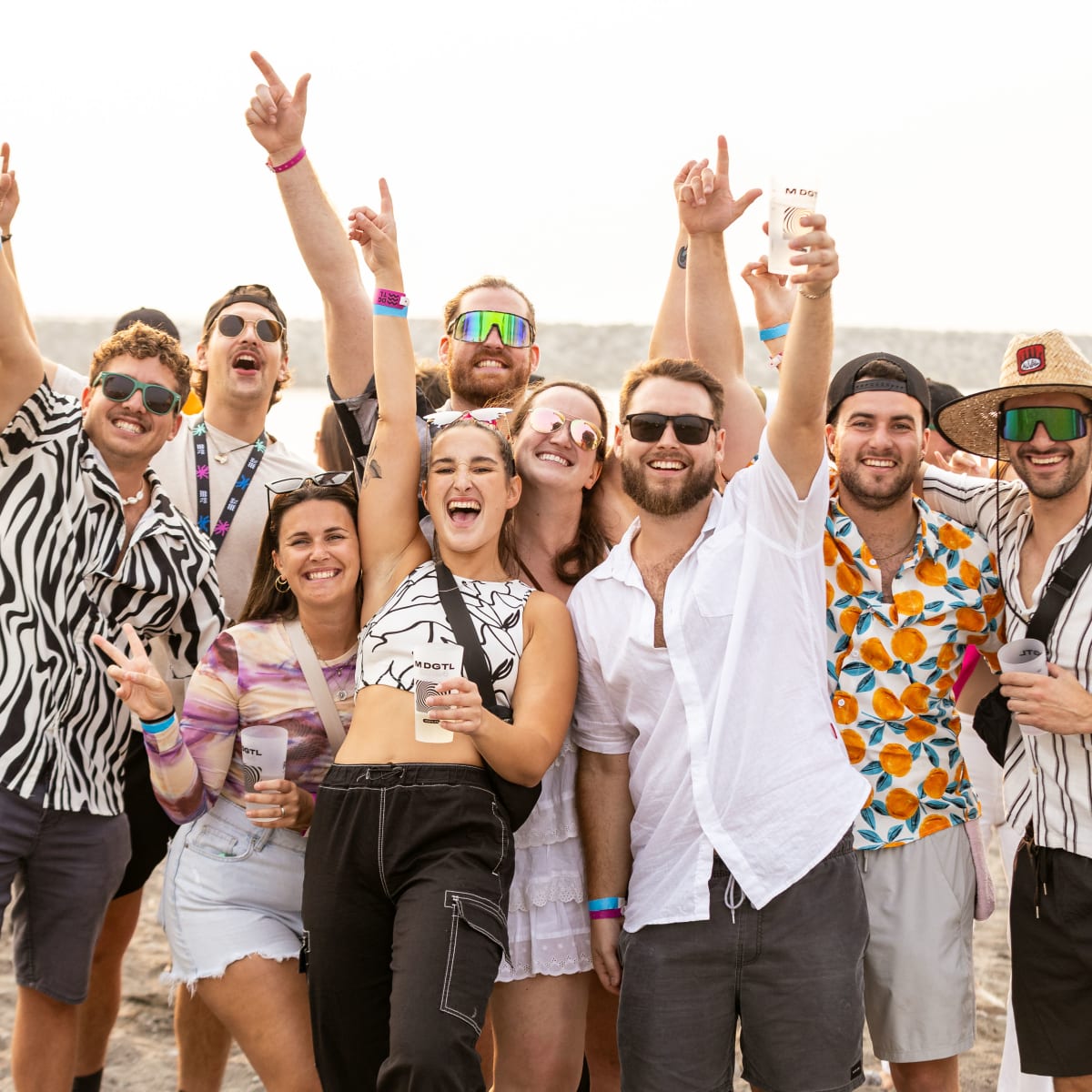 M DGTL - Young adults partying at the beach