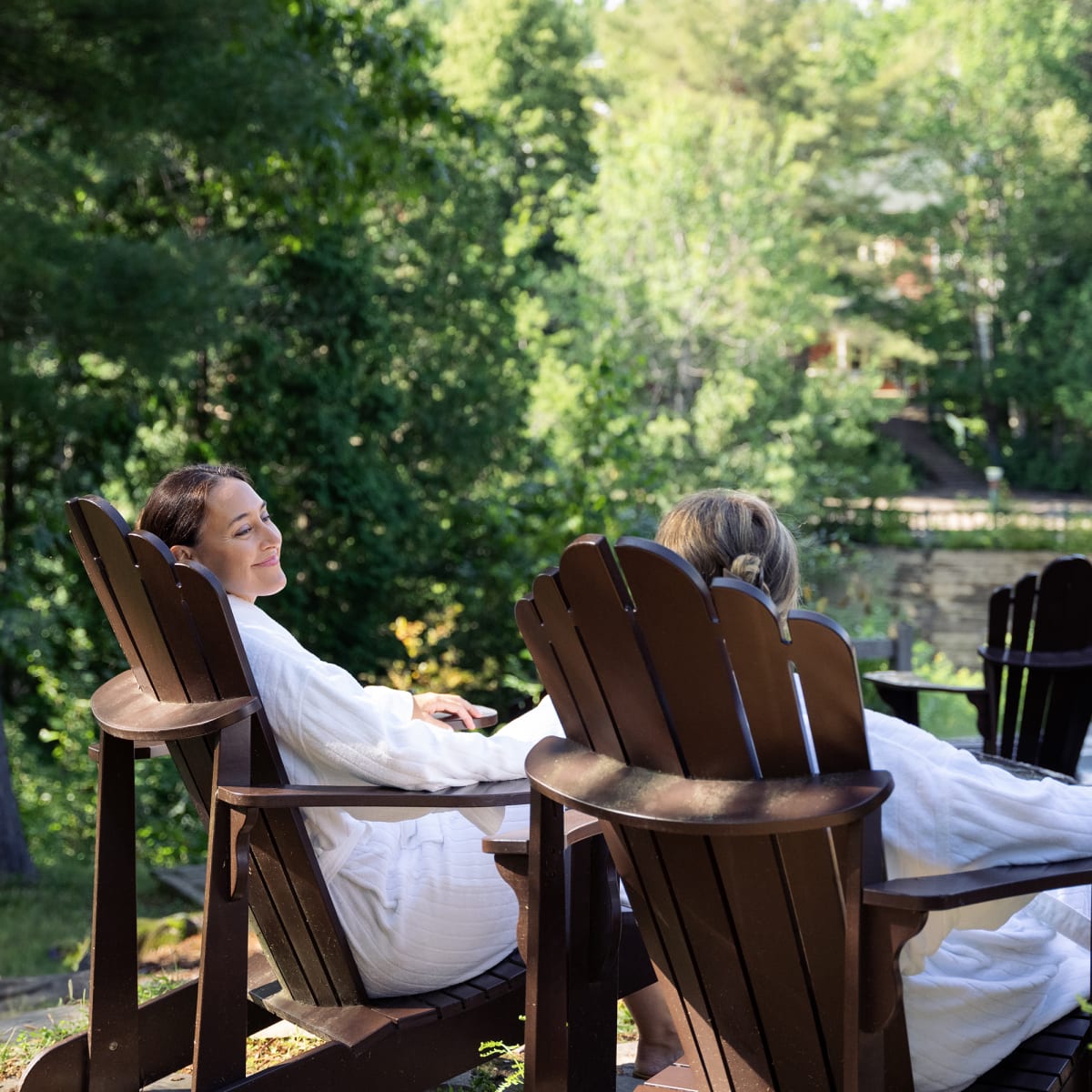 Two girls on chairs outside
