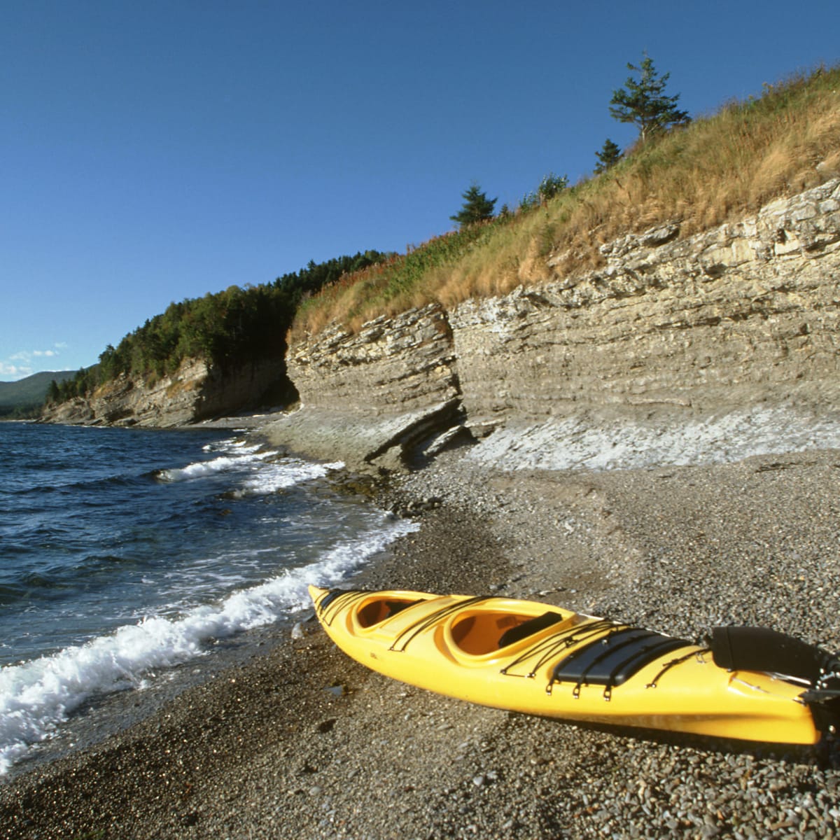 Forillon beach and a kayak.