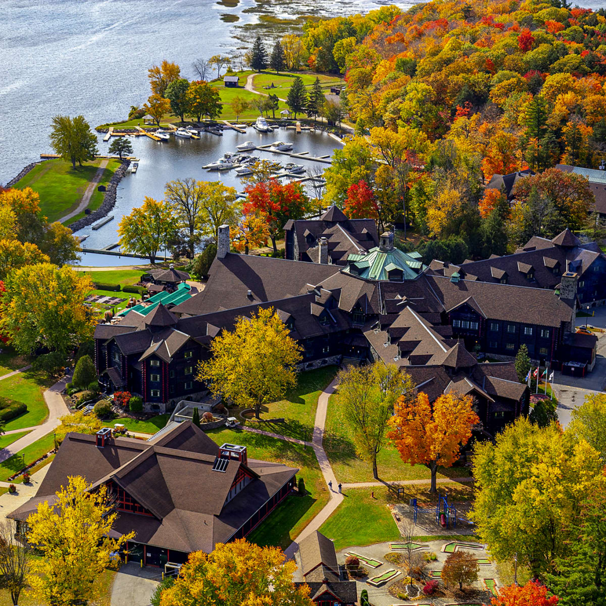 Fairmont Le Château Montebello and the Ottawa River in the fall.