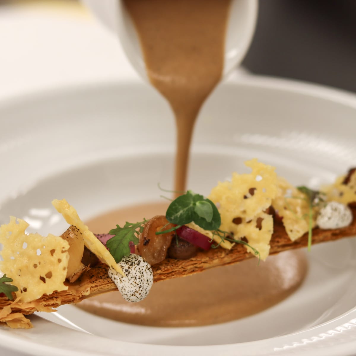 Fine dining dish served at Le Riverain restaurant at Hotel & Spa Ripplecove.