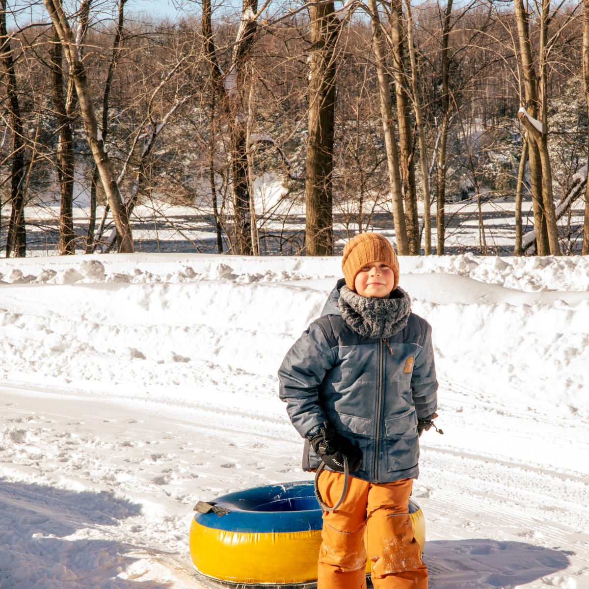 Tourisme Drummondville young boy enjoying snow tubing