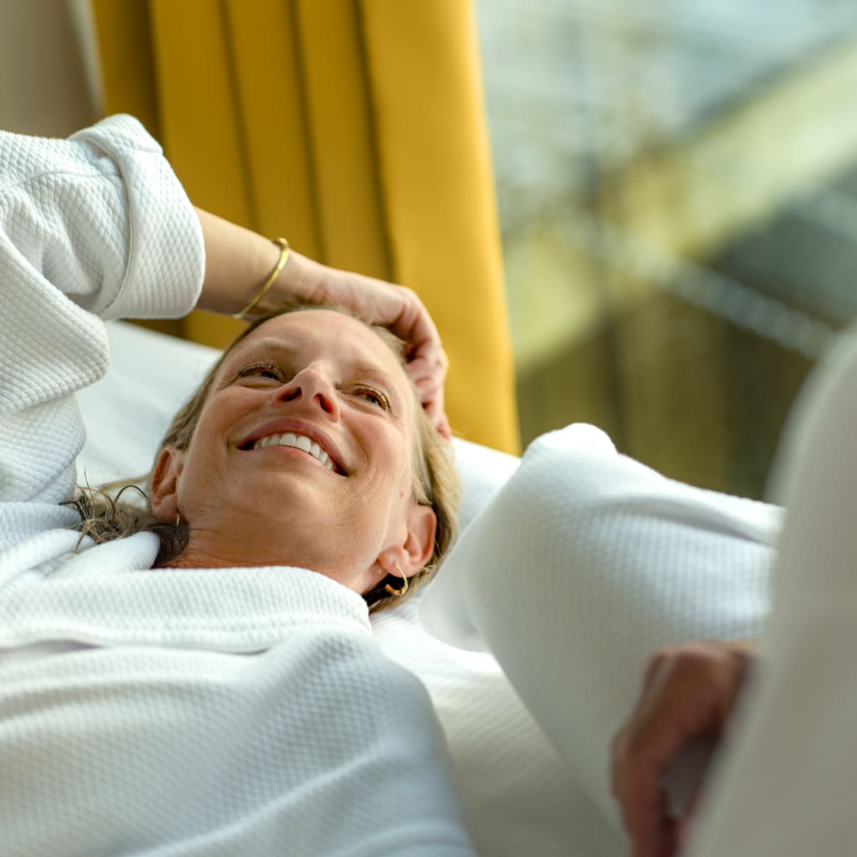 Woman in a bathrobe.