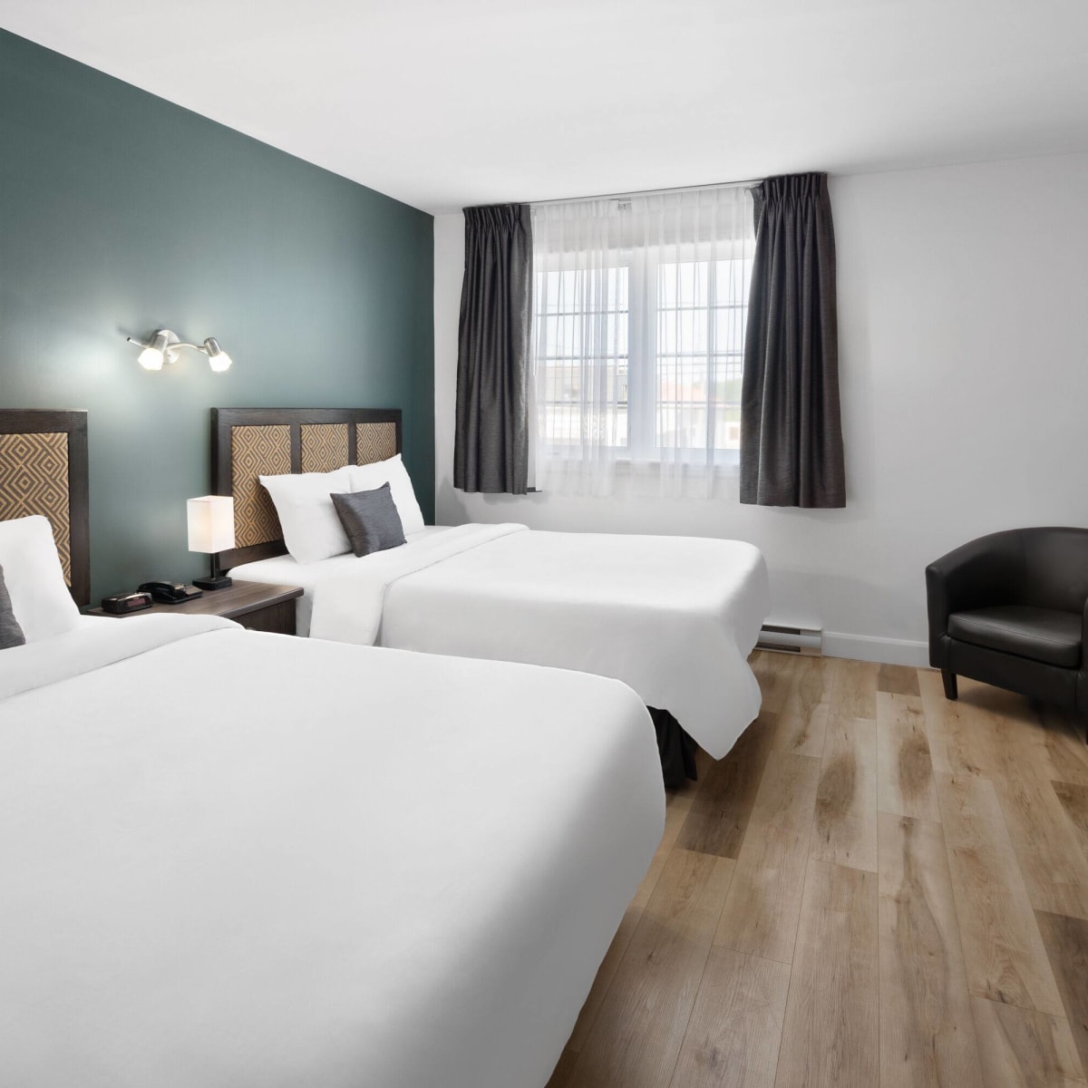 Travelodge by Wyndham Roberval - Chambre avec deux lits