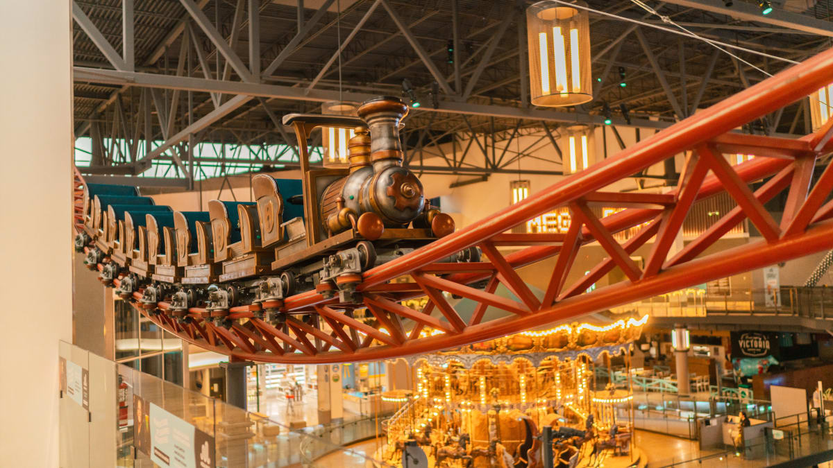 Train-shaped roller coaster at Méga Parc.