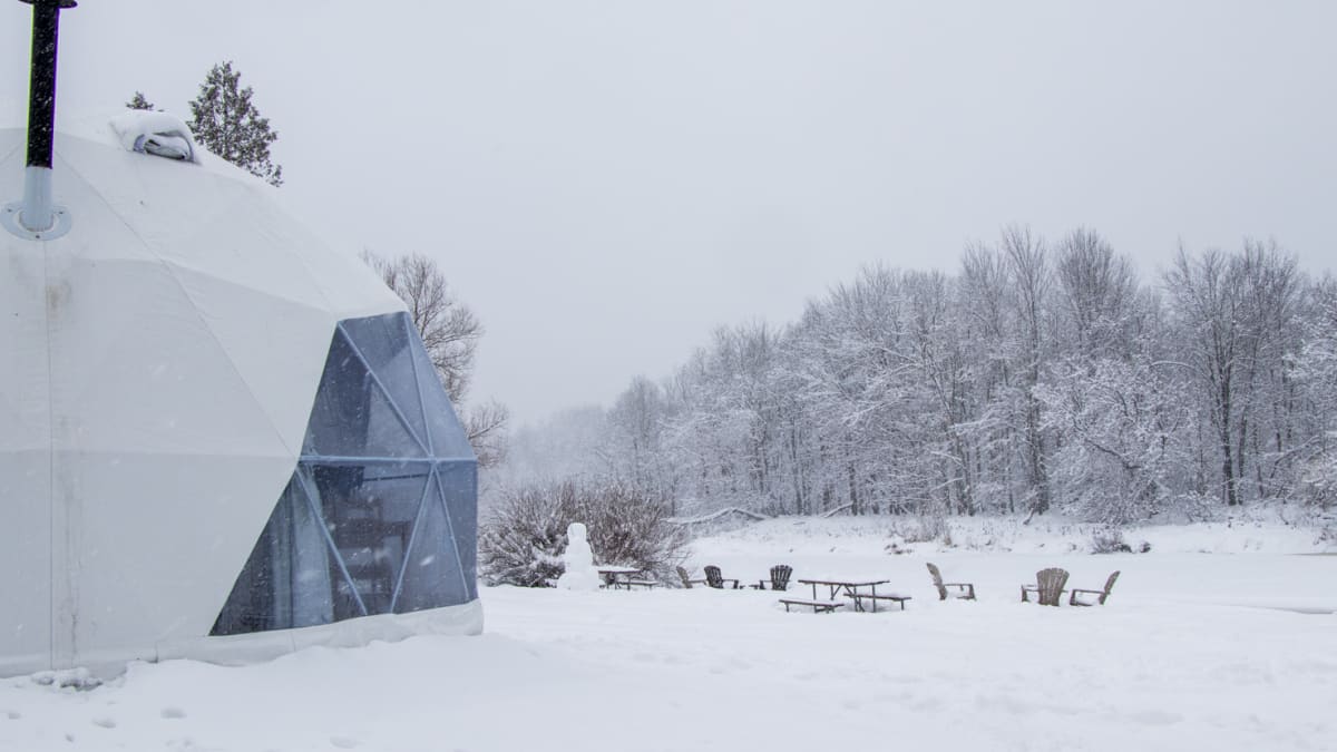Ready-to-camp dome in a winter setting.