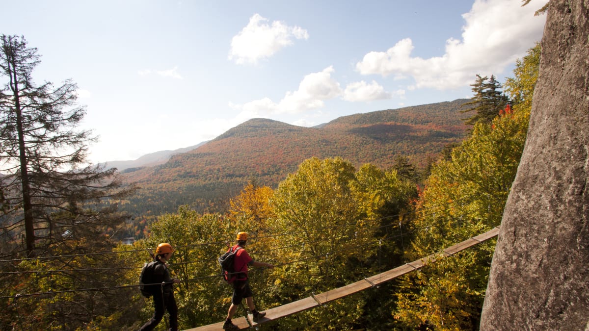 Two people on a via ferrata at the parc national du Mont-Tremblant.