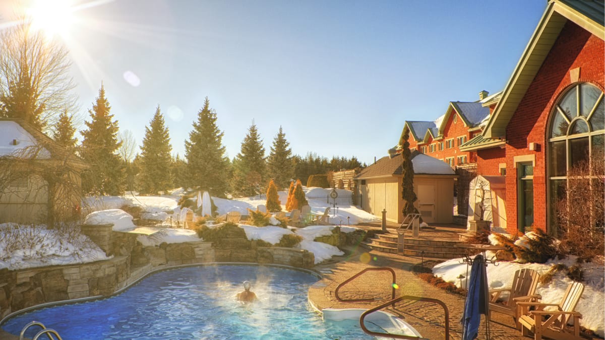 Outdoor spa facilities at the Auberge Godefroy in the winter.