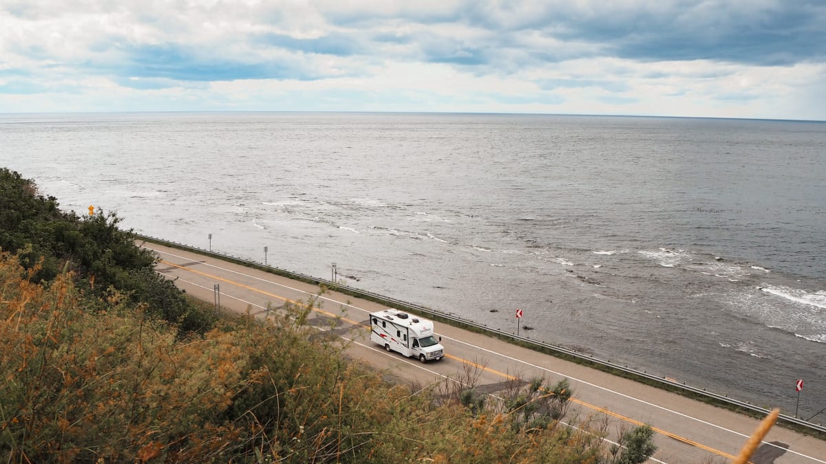 RV on a seaside road
