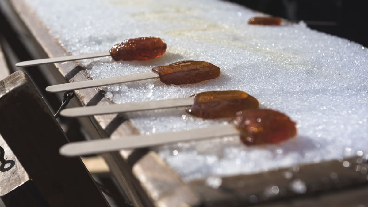 4 sticks of maple taffy on snow