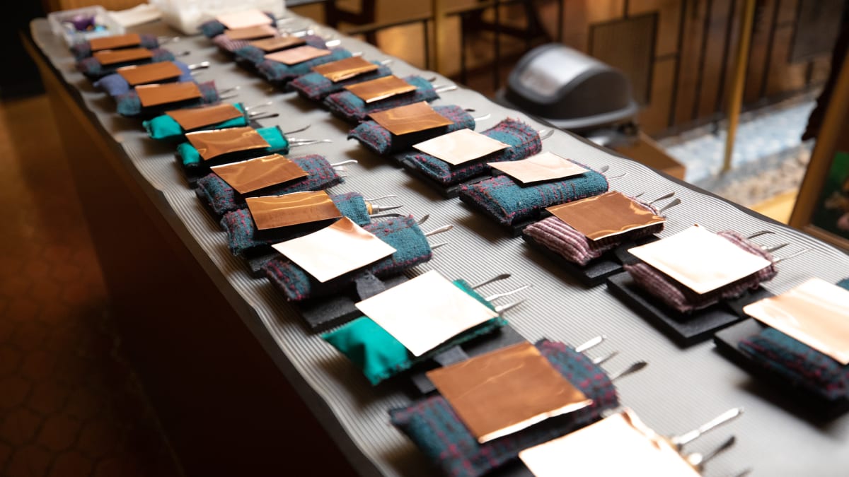 Table with materials for a copper crafting workshop.