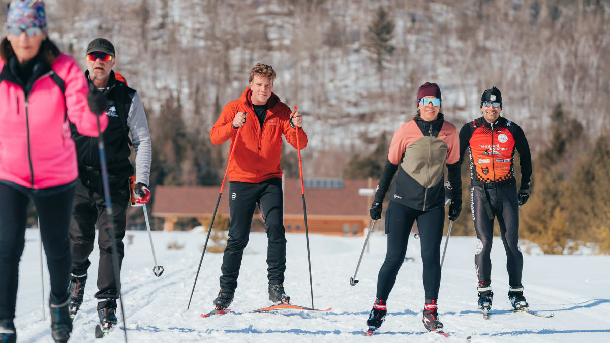Group of 5 cross-country skiers.
