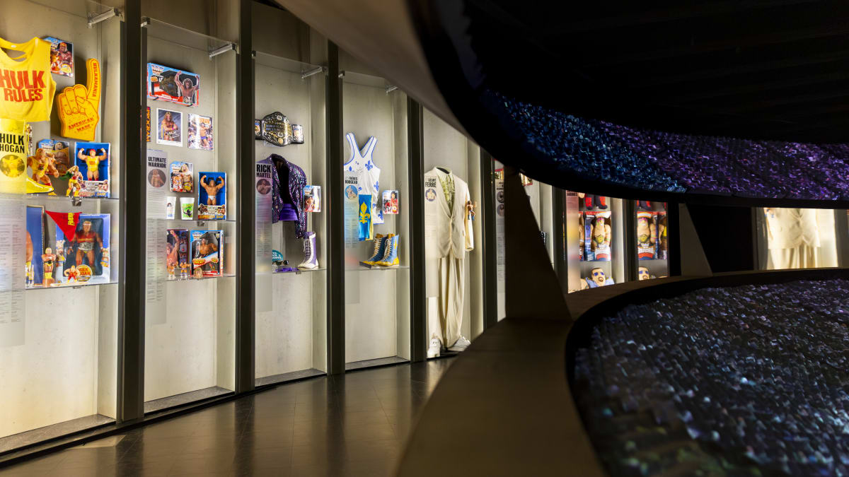 Wall display of wrestling artifacts.