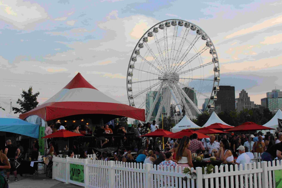Crowd at the Taste of the Caribbean festival in front of the Montreal ferris wheel