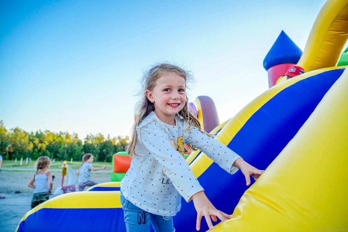 Kid in a bouncy castle at Ciné-Parc Orford