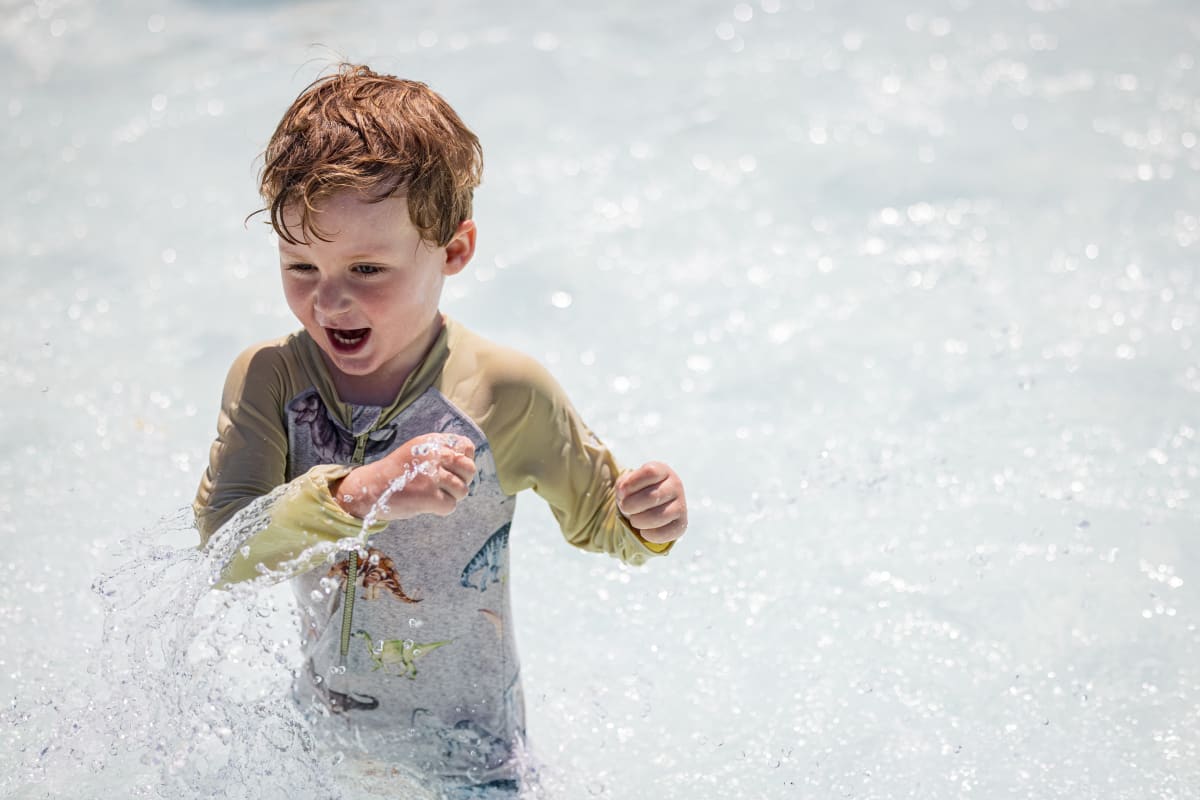 Boy at Water park at Zoo de Granby.