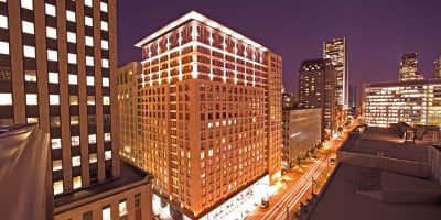 Embassy Suites by Hilton Montreal - Illuminated exterior of the hotel at night