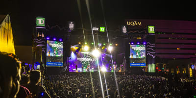 Crowd in front of a giant screen