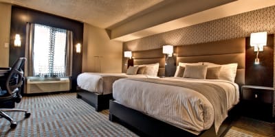 Chambre avec deux lits de l'Hôtel Nouvelle Frontière.