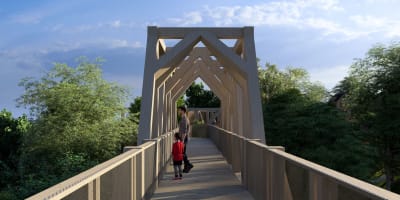Enfant et parent sur une passerelle à la La Place des Sommets.