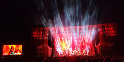 Outdoor stage illuminated at night
