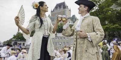 Les Fêtes de la Nouvelle-France - A man and a woman in costume from the 18th century