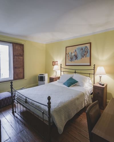 The Auguste room: double bed, shared bathroom
