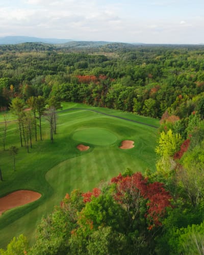 Aerial view of the Centre de Golf Le Versant in autumn.