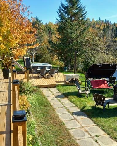 Chalet Castello & Spa - Cours arrière avec terrasse et spas