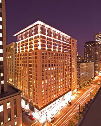 Embassy Suites by Hilton Montreal - Illuminated exterior of the hotel at night