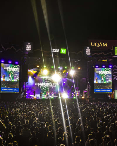 Crowd in front of a giant screen