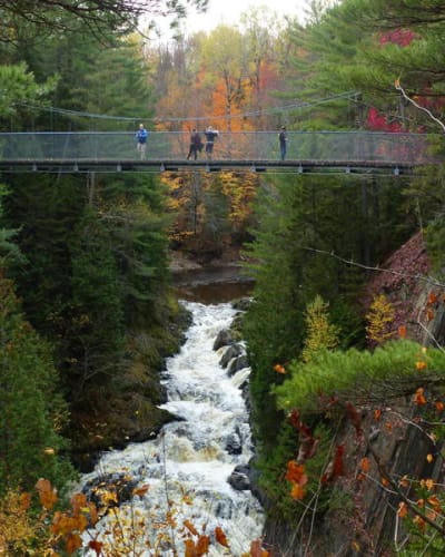 Suspended walkways in the fall beneath the waterfalls. 