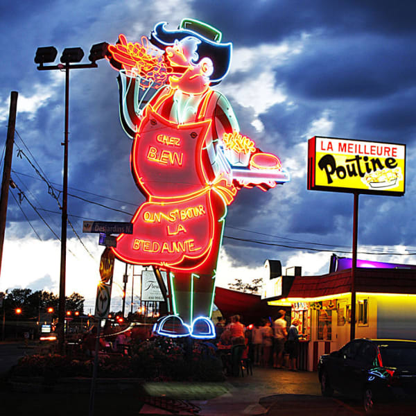 Neon sign of Cantine Chez Ben on s’bour la bedaine.