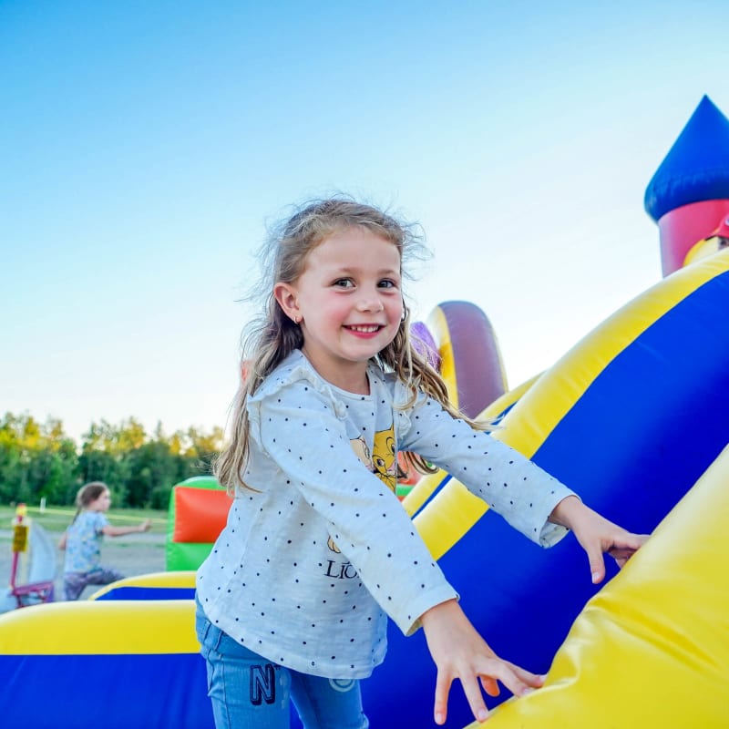 Kid in a bouncy castle at Ciné-Parc Orford