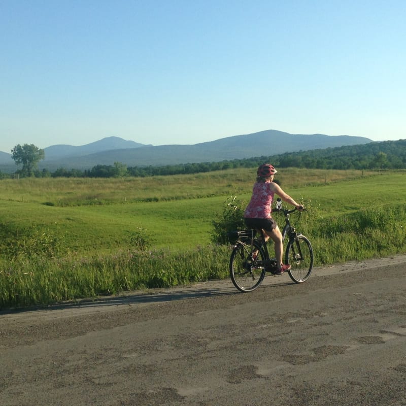 Cyclist on a country road in Memphrémagog.