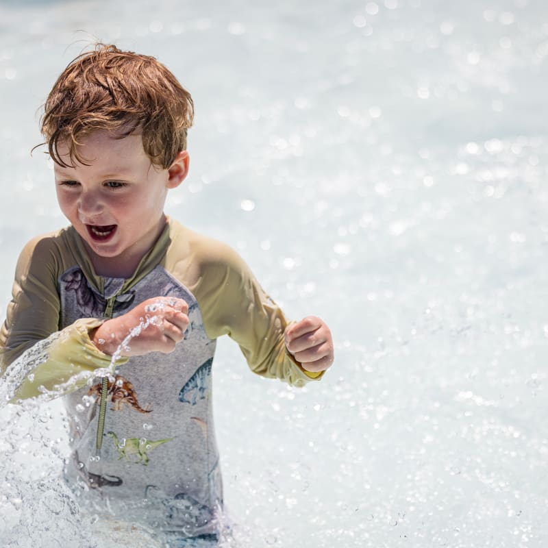 Boy at Water park at Zoo de Granby.